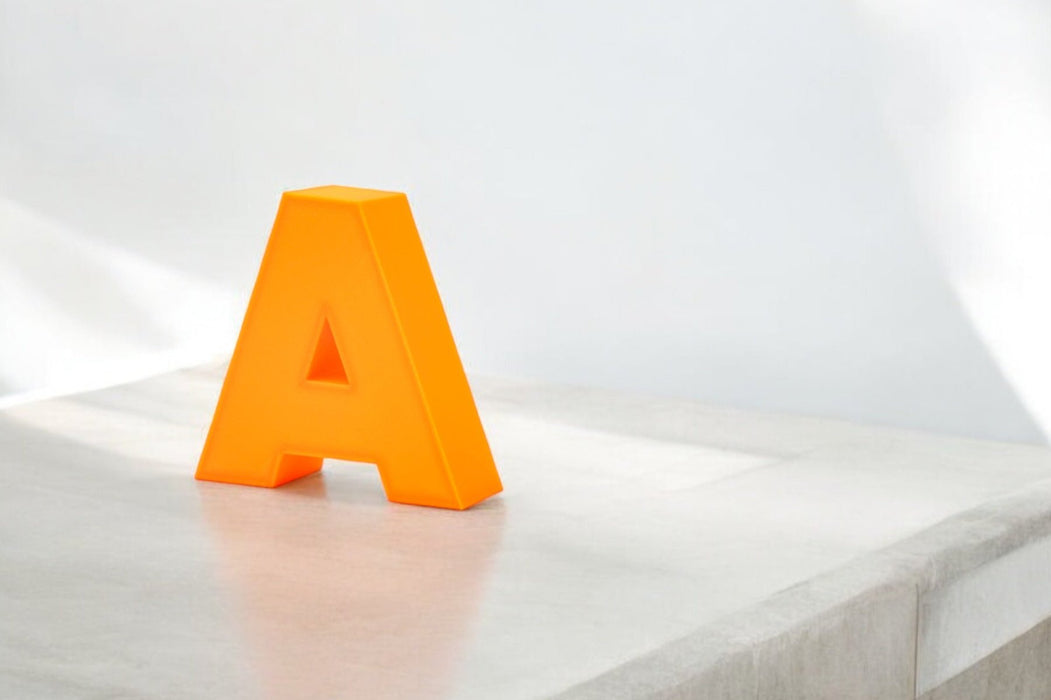Letra 3D Naranja Fluor